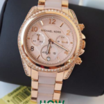 Elegant Crystal Bezel Gold Finish Women’s Watch