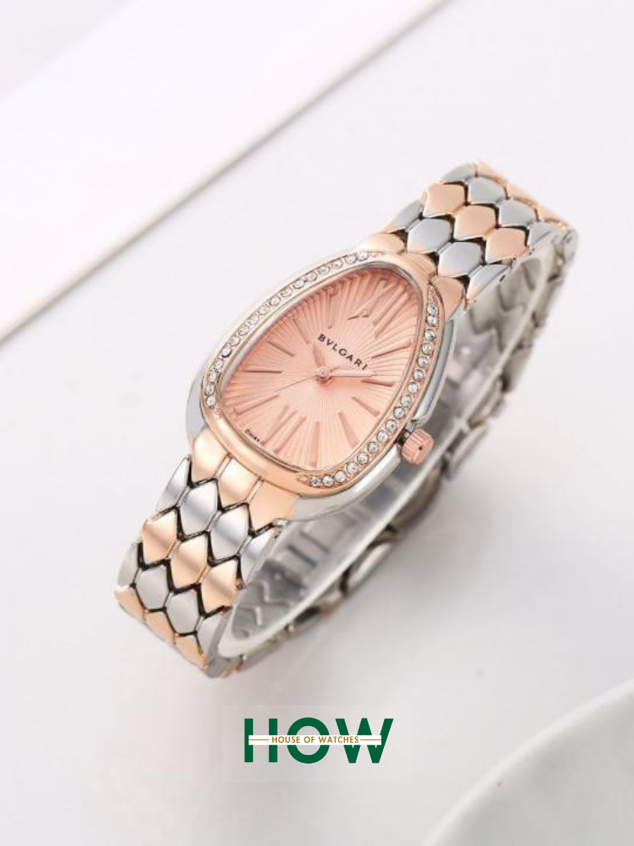 Image00002 Elegant 2-Tone Copper & Pink Serpentine-Style Ladies Watch - Image 1
